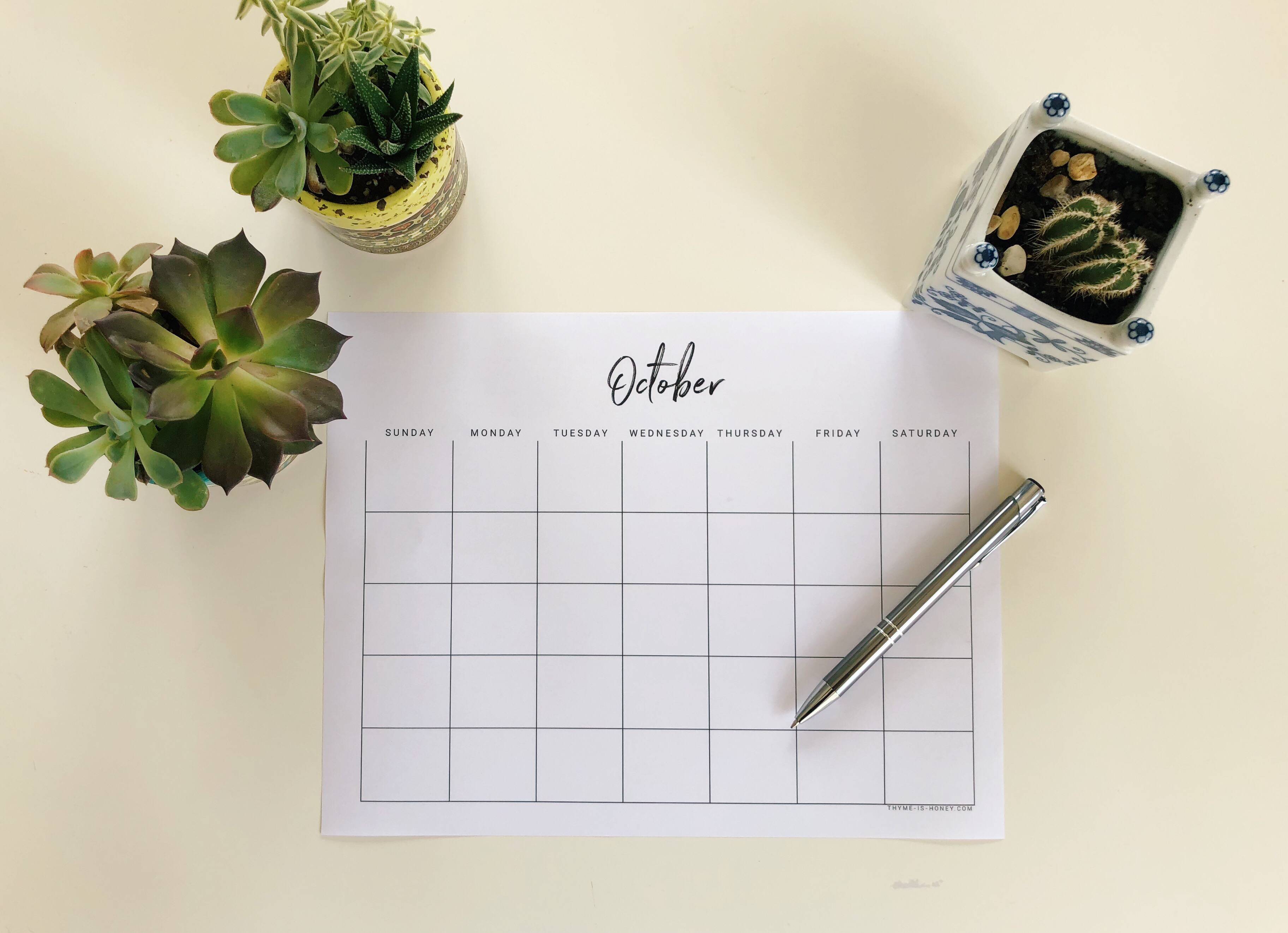 A monthly calendar from October. Calendars and planners are excellent organizational tools that can help reduce stress at work through better planning.