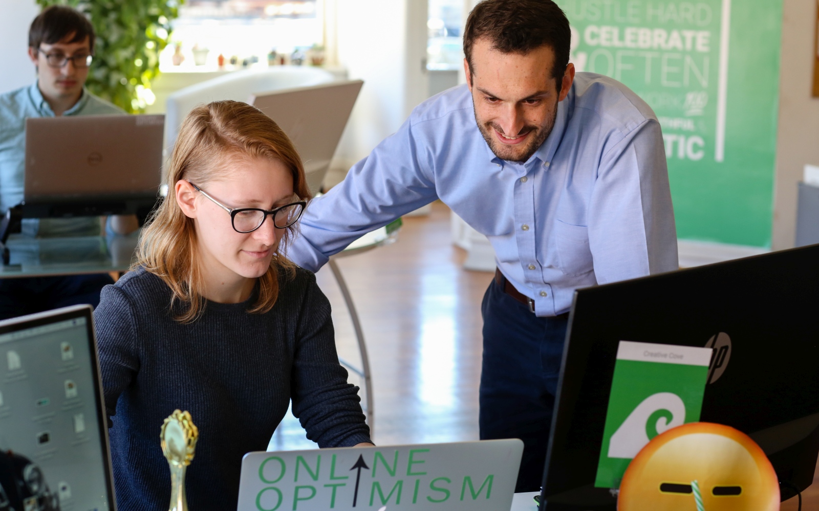 Sam and Lauren working on our Content Team