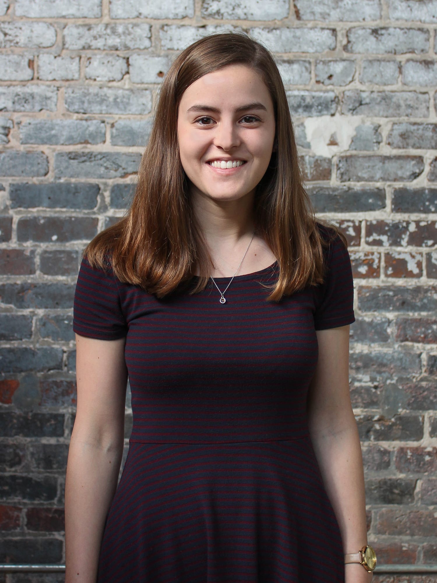 Claire Escobedo, Associate Digital Designer