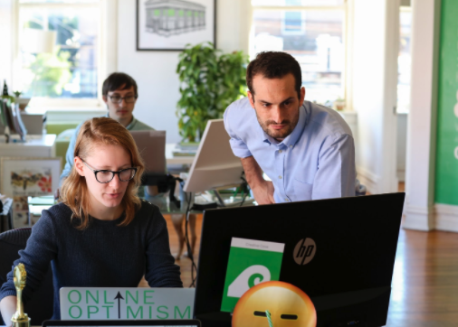 Flynn, Sam, and Lauren in the New Orleans office