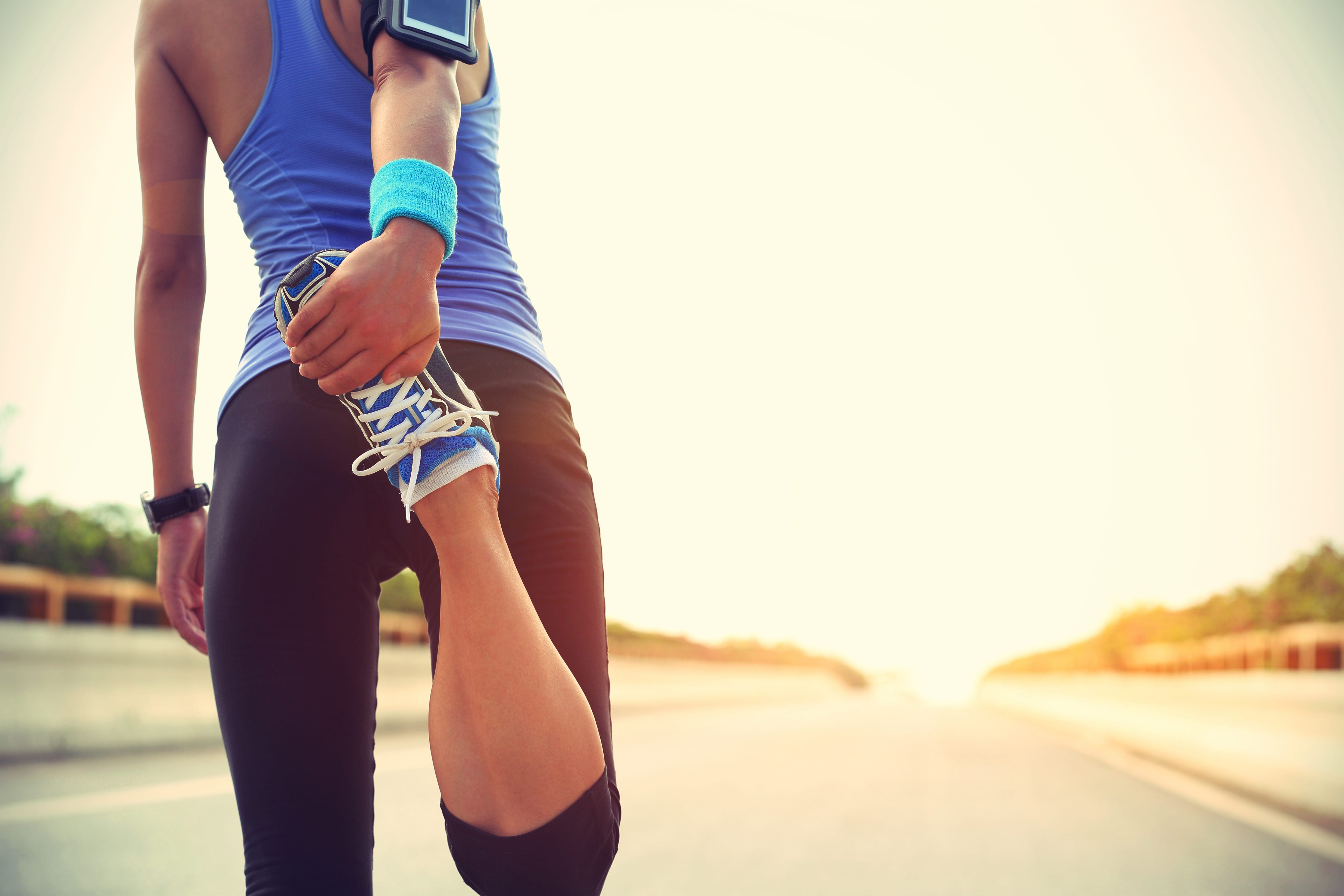 Female runner stretching