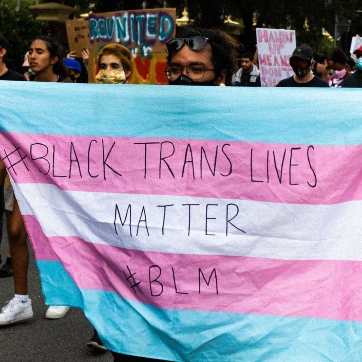 Black Trans Lives matter on a transgender flag