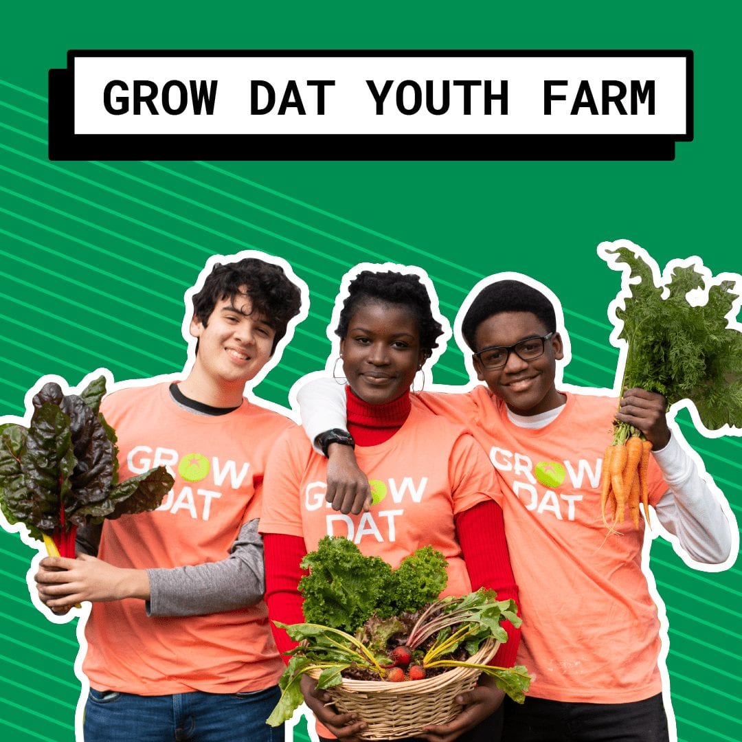 Grow Dat youth farm people holding vegetables