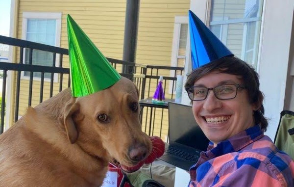 Flynn and Pimms with birthday hats