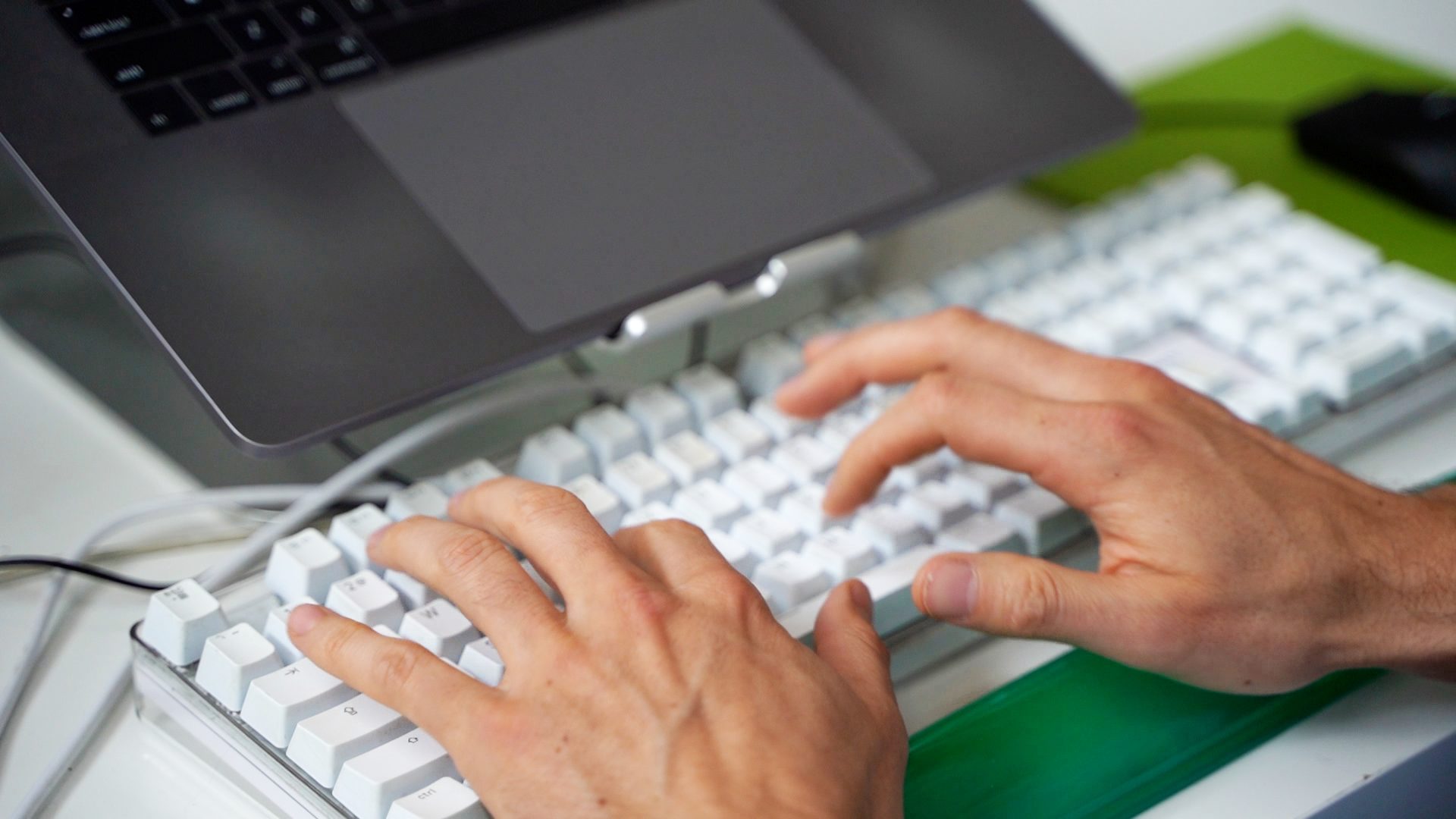 Optimist types on a keyboard