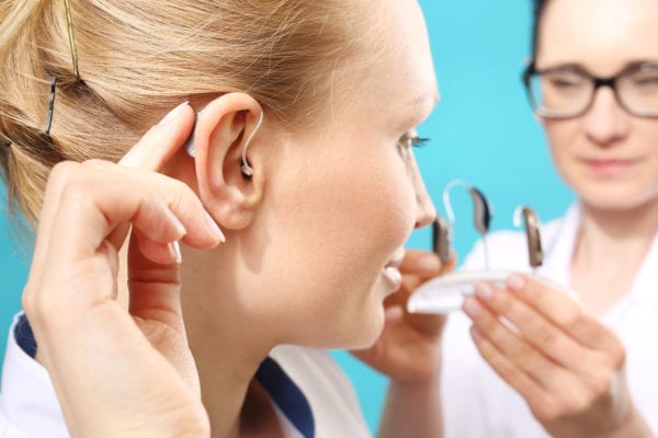 woman wearing hearing aid