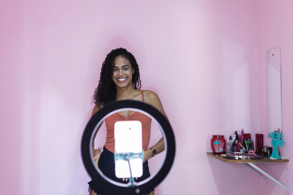 influencer filming a video with a ring light